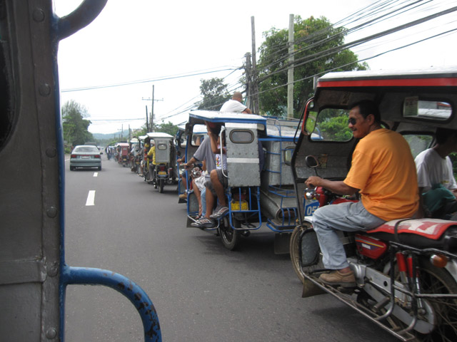 Train of Tricycles near Iriga City