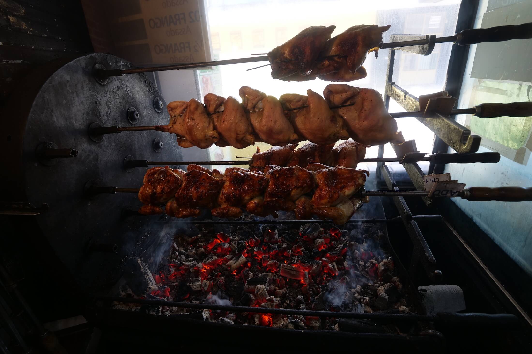 Amazing and beautiful style of rotating chickens over hot coals - it couldn't be more pretty