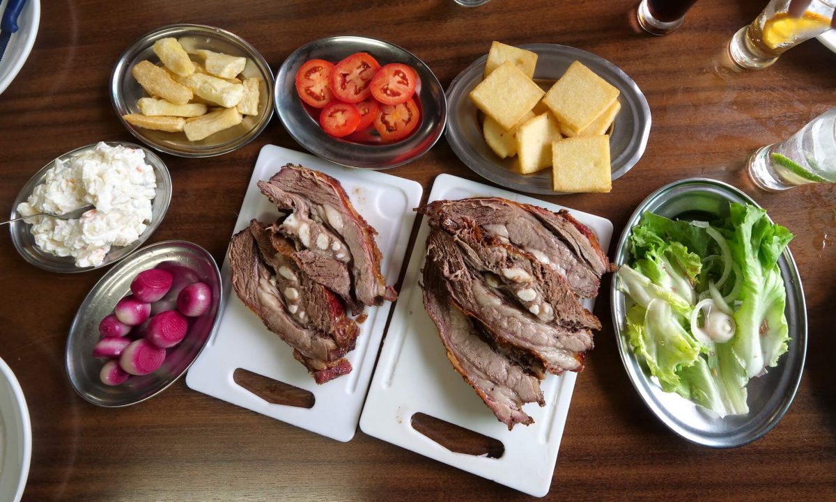 Full table of meat with sides Costelao do Gaucho