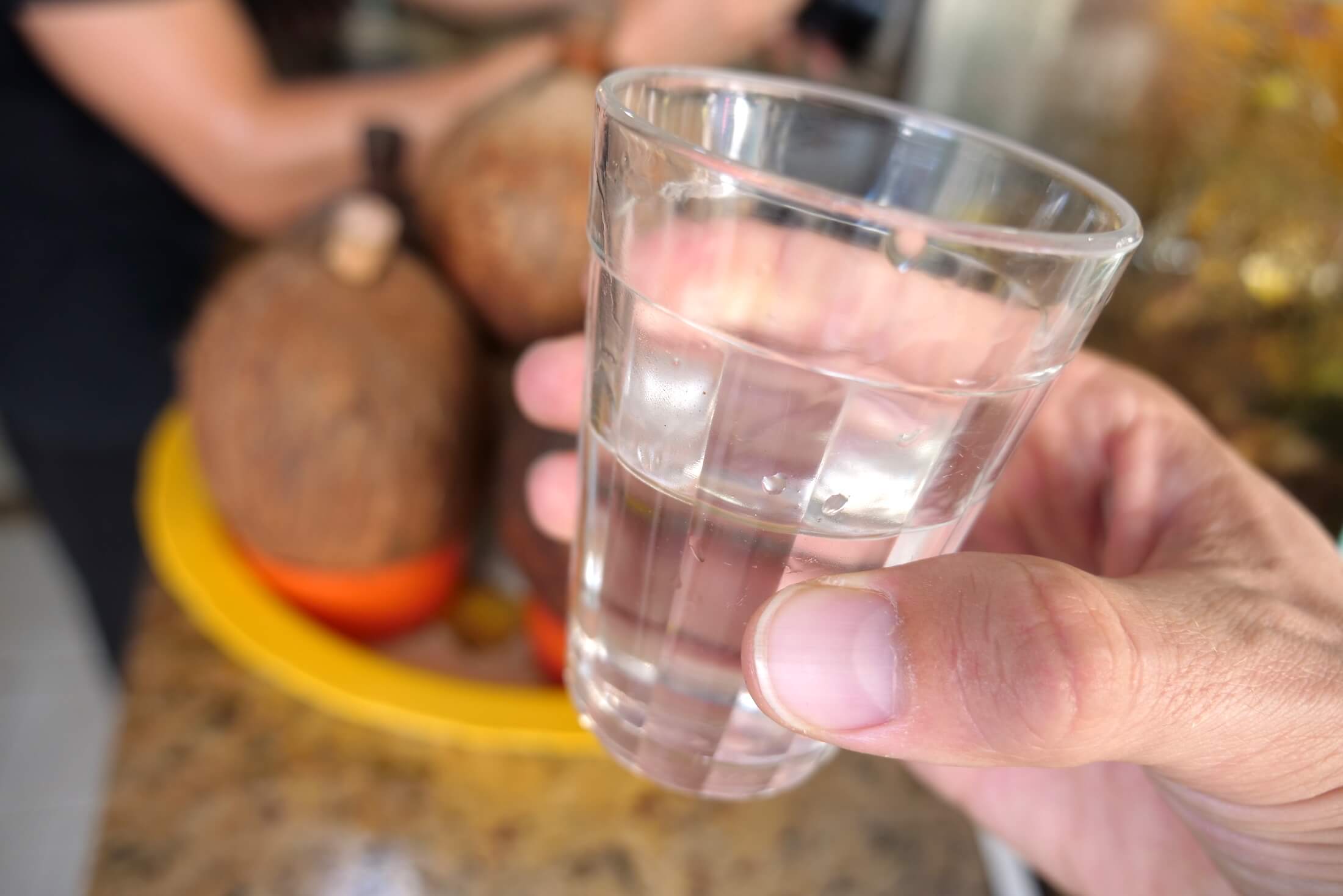 Try a small glass of their in-house coconut alcohol - serving it from the coconut shell
