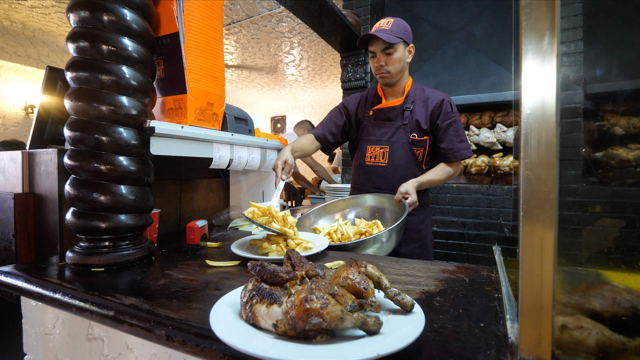 Lima's best food, Pollo a la Brasa is grilled chicken served with golden french fries