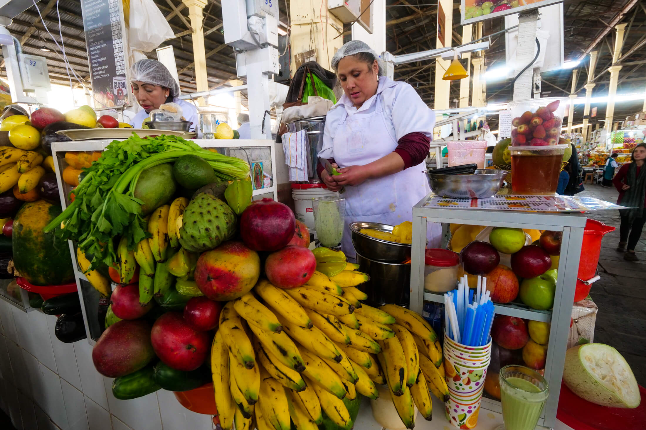 Fresh fruit smoothies and juices here, also vegetables, nearly overflowing the aisles