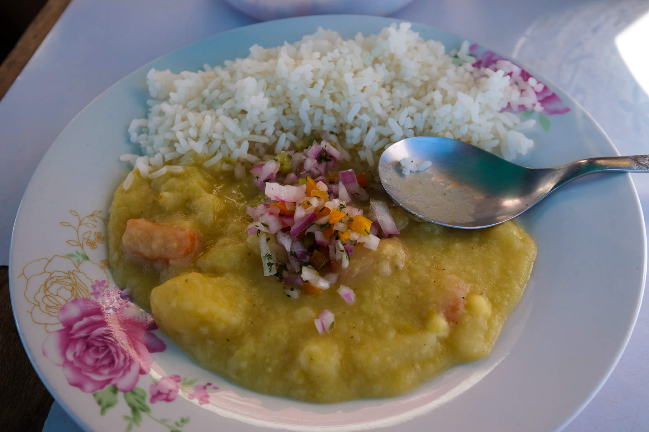 Kapchi de Habas is A hearty plate of cauliflower, carrots, and potatoes to go with white rice