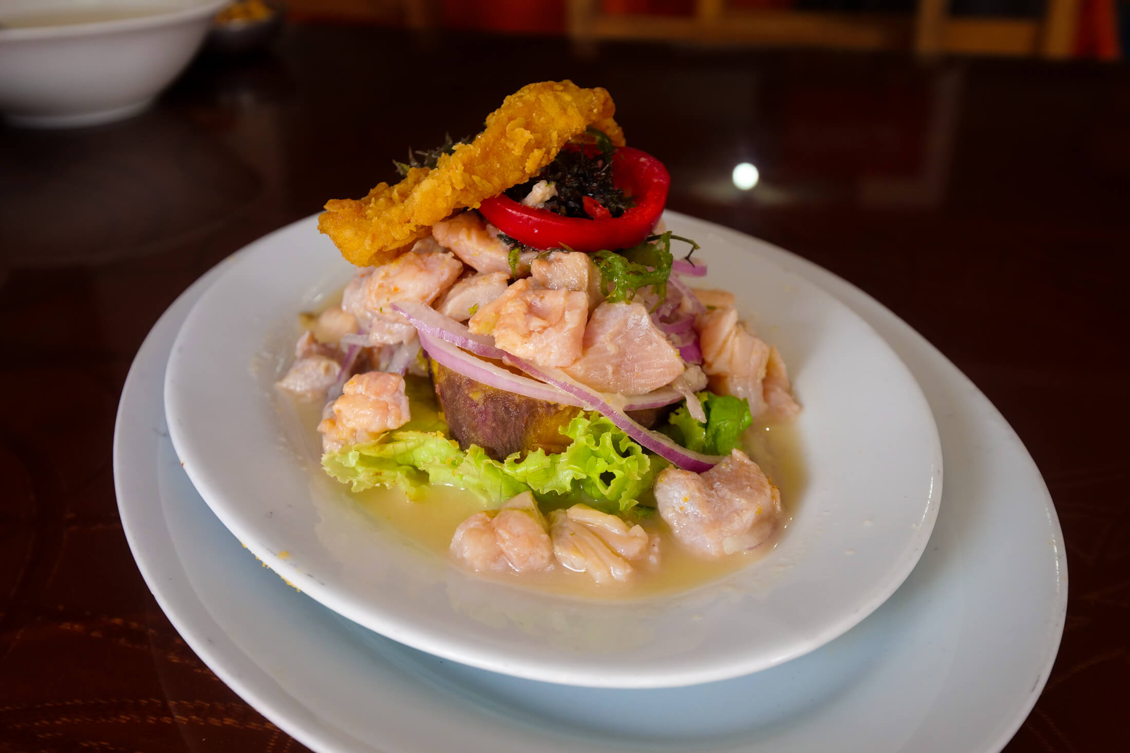 Raw ceviche made with trucha, which is trout, from Cusco's lakes or rivers