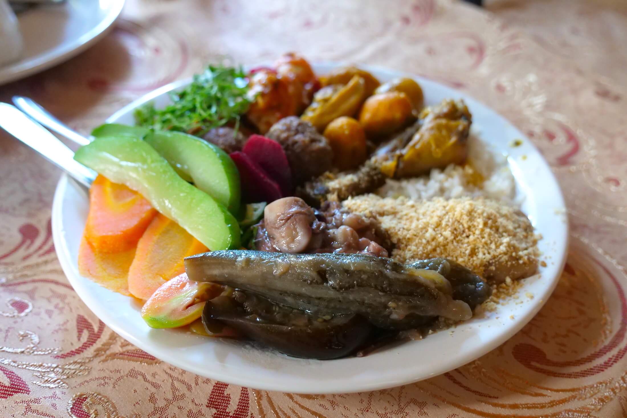 combination of Pequi, with cooked veggies, fried meats, and raw salads for lunch at Restaurante Braseiro