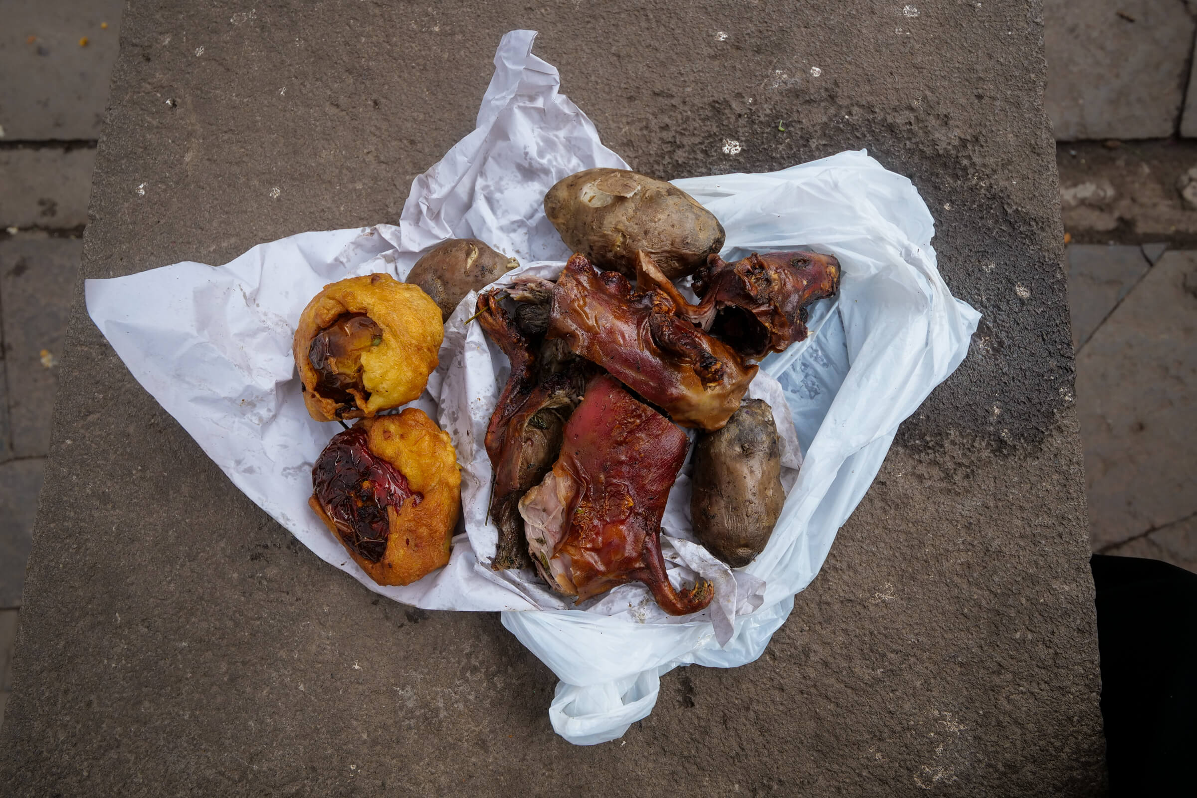 Cuy for breakfast at the San Pedro Market in Cusco.