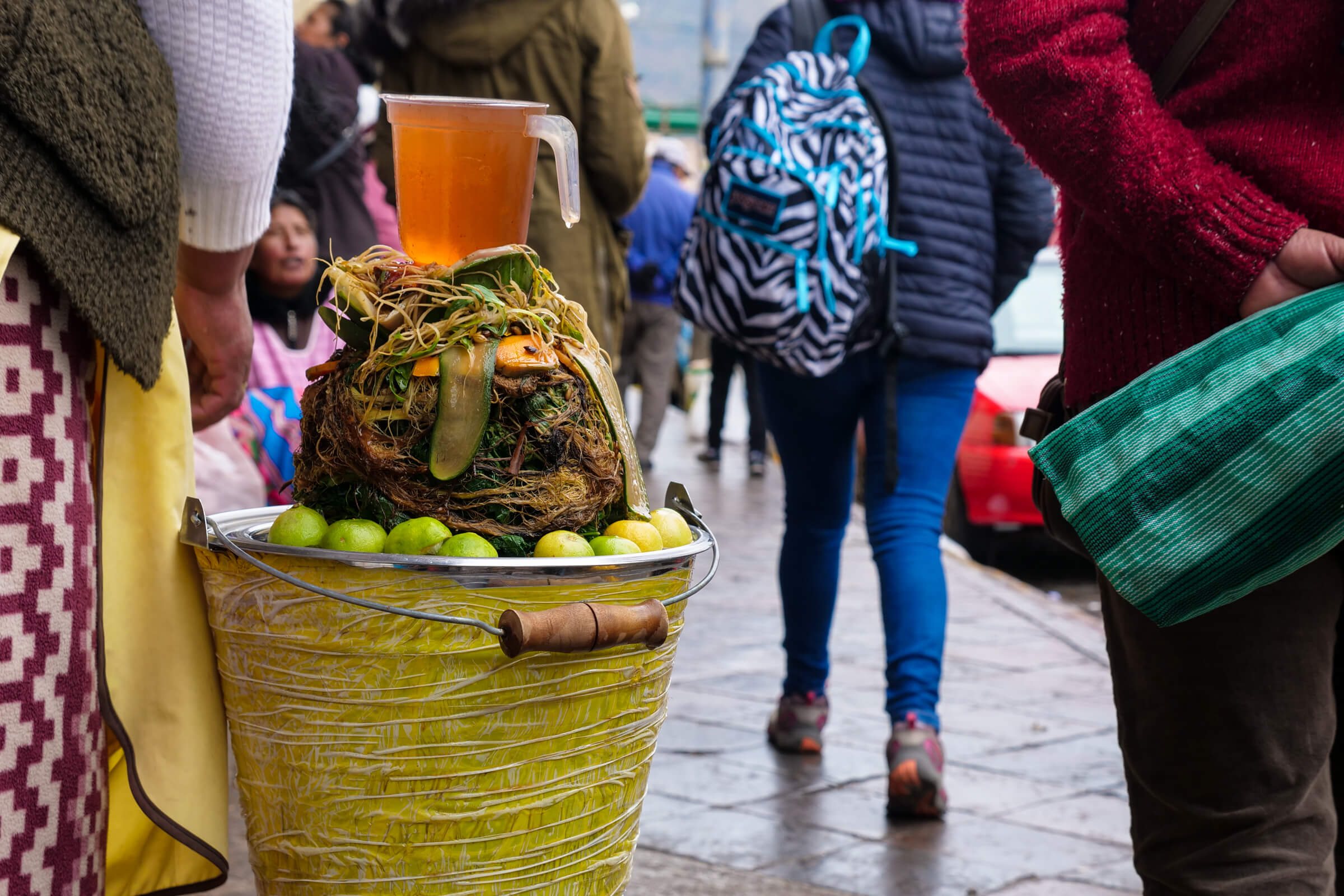 a cup of 'mate' to stay warm, outside San Pedro Market